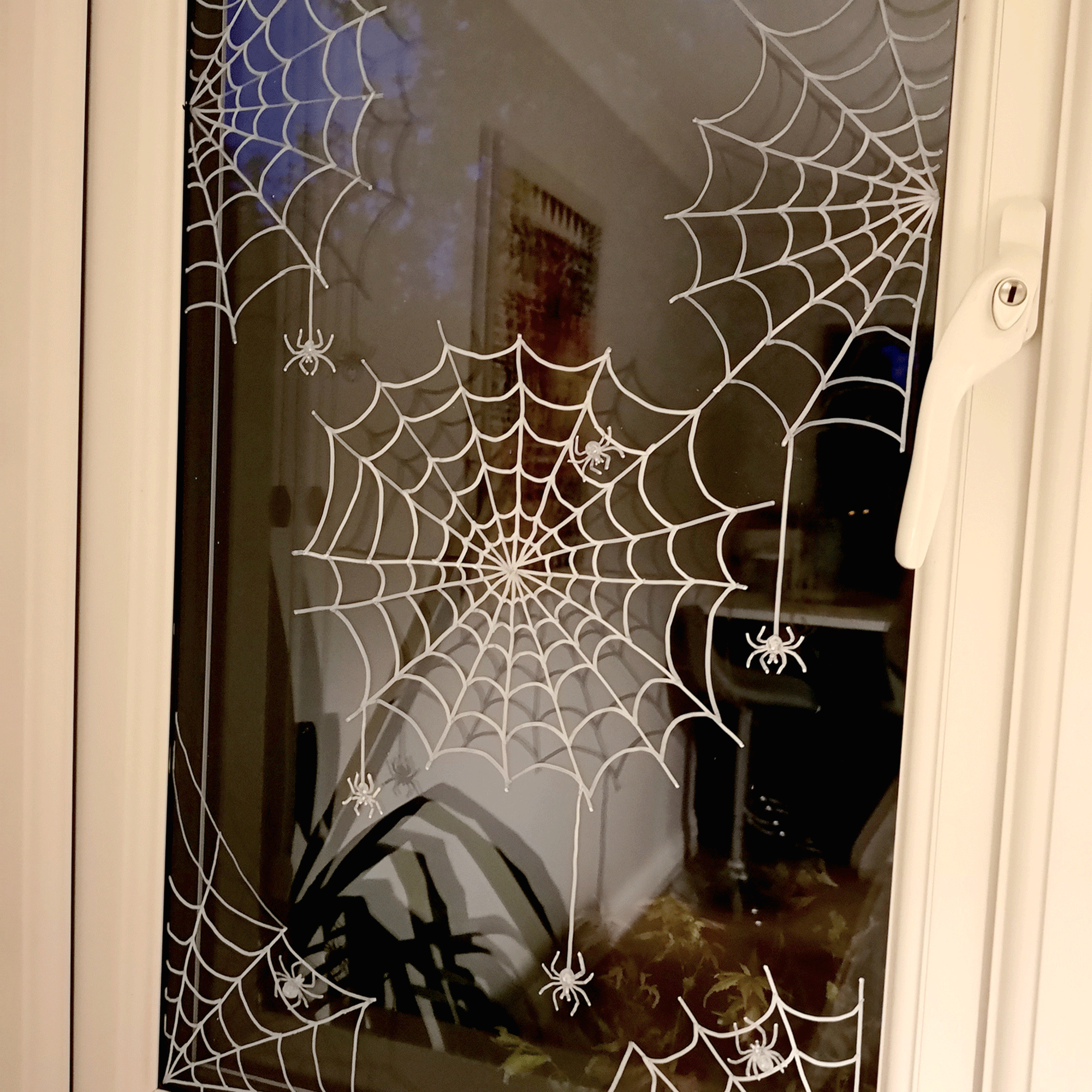 Chalk cobweb on a window