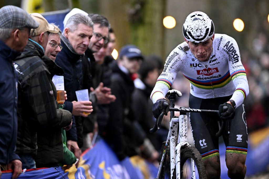 Dutch Mathieu Van Der Poel (R) competes during the stage 7 (out of 12) of the men's UCI Cyclocross World Cup elite race in Gavere, northern Belgium, on December 26, 2024. (Photo by JASPER JACOBS / Belga / AFP) / Belgium OUT