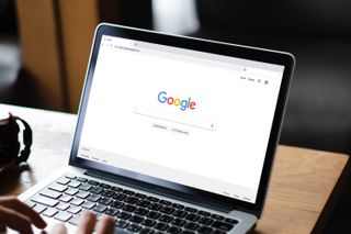 Google search page on a laptop screen