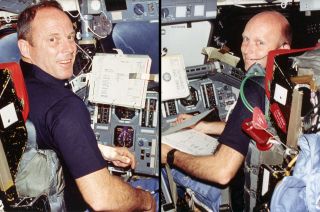 STS-3 commander Jack Lousma (at left) and pilot Gordon Fullerton at their stations on board the flight deck of space shuttle Columbia in March 1982.