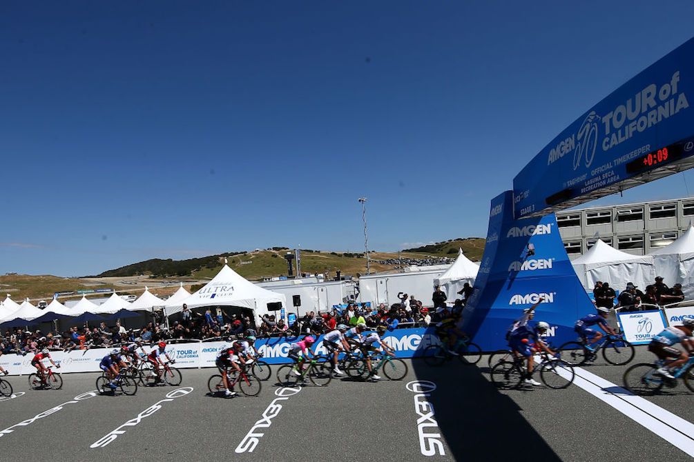 The peloton crosses the line at Laguna Seca on stage 3 of the 2018 Tour of California