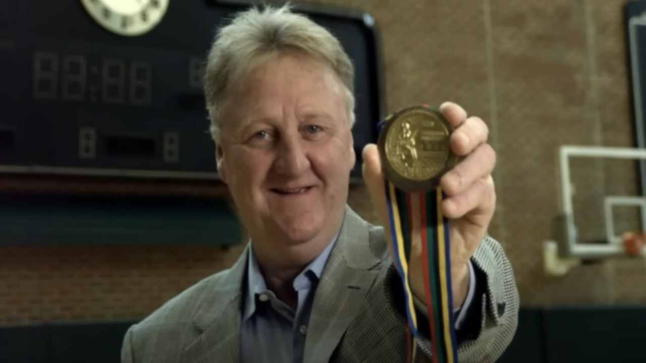 Larry Bird showing off his Olympic gold medal in The Dream Team