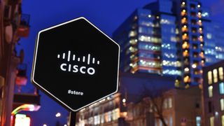 The Cisco logo displayed on a sign in a city
