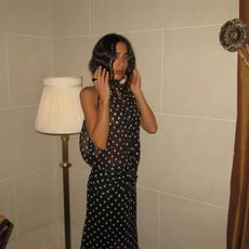 Camelia Farhoodi wearing a polka dot dress. 