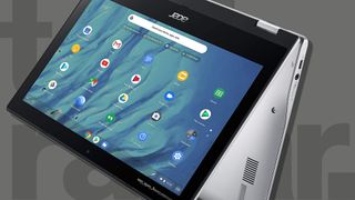 A Chromebook against a gray TechRadar background
