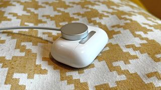 AirPods Pro 2 with an Apple Watch charger