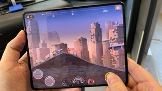 The Samsung Galaxy Z Fold 3 playing a game