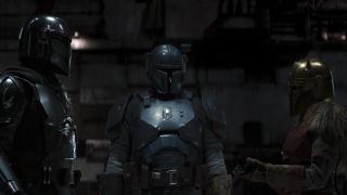 The Mandalorian speaking with The Armorer and Paz Vizsla