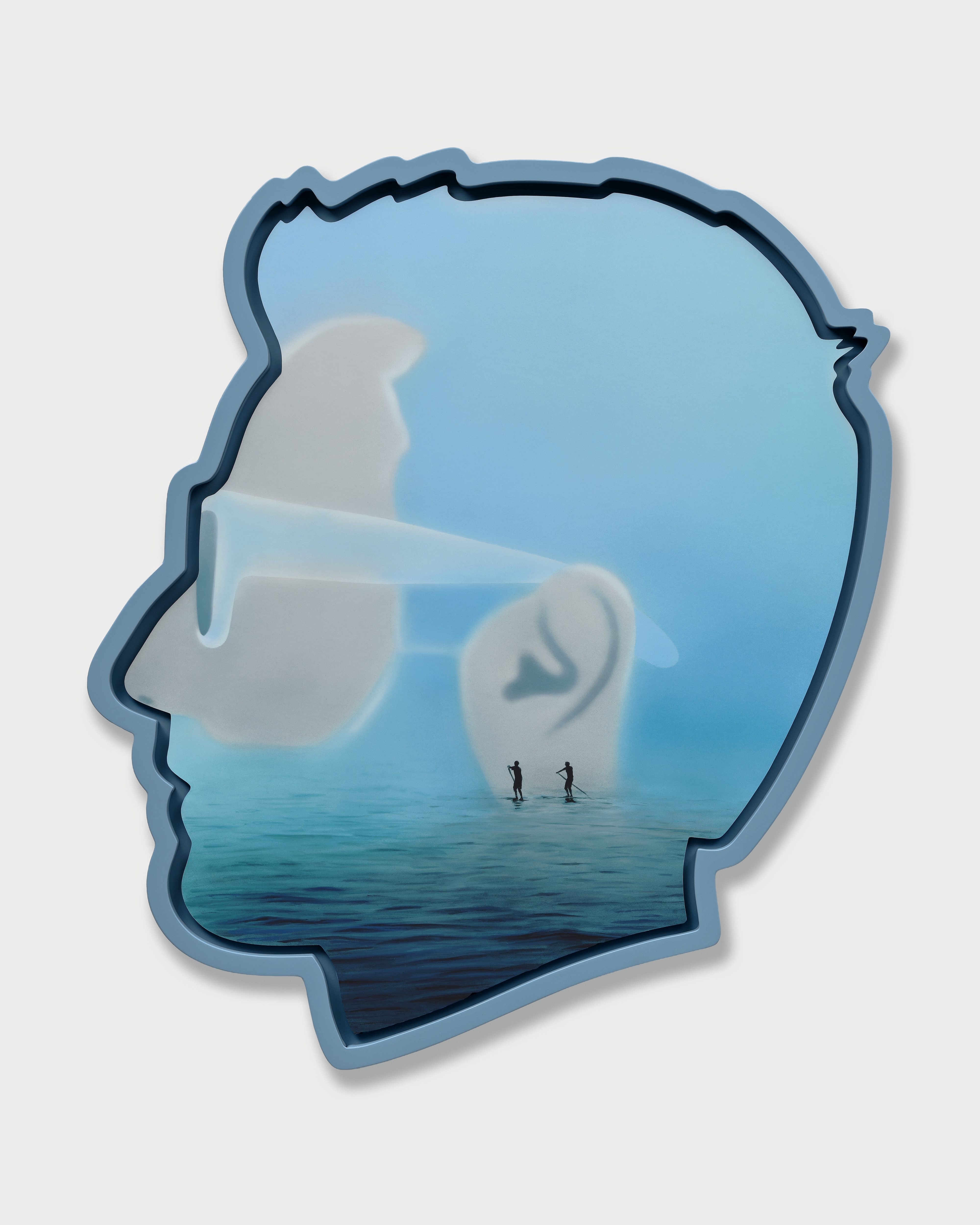 outline of head with brightly coloured image inside