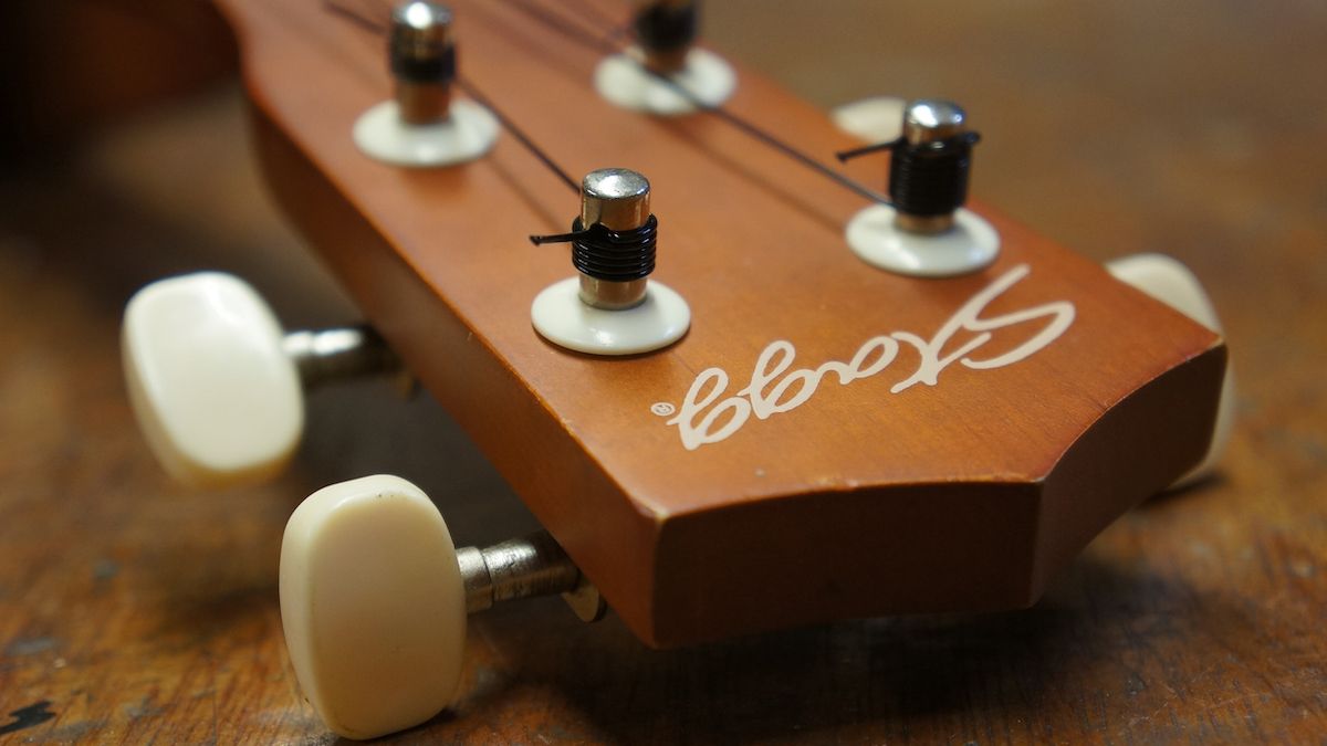 Ukulele headstock with fresh strings attached