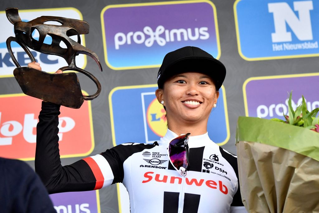 Winner US Coryn Rivera celebrates on the podium of the women's race the 101st edition of the Ronde van Vlaanderen - Tour des Flandres - Tour of Flanders one day cycling race, a 260km race from Antwerp to Oudenaarde, on April 2, 2017. (Photo by DIRK WAEM / BELGA / AFP) / Belgium OUT