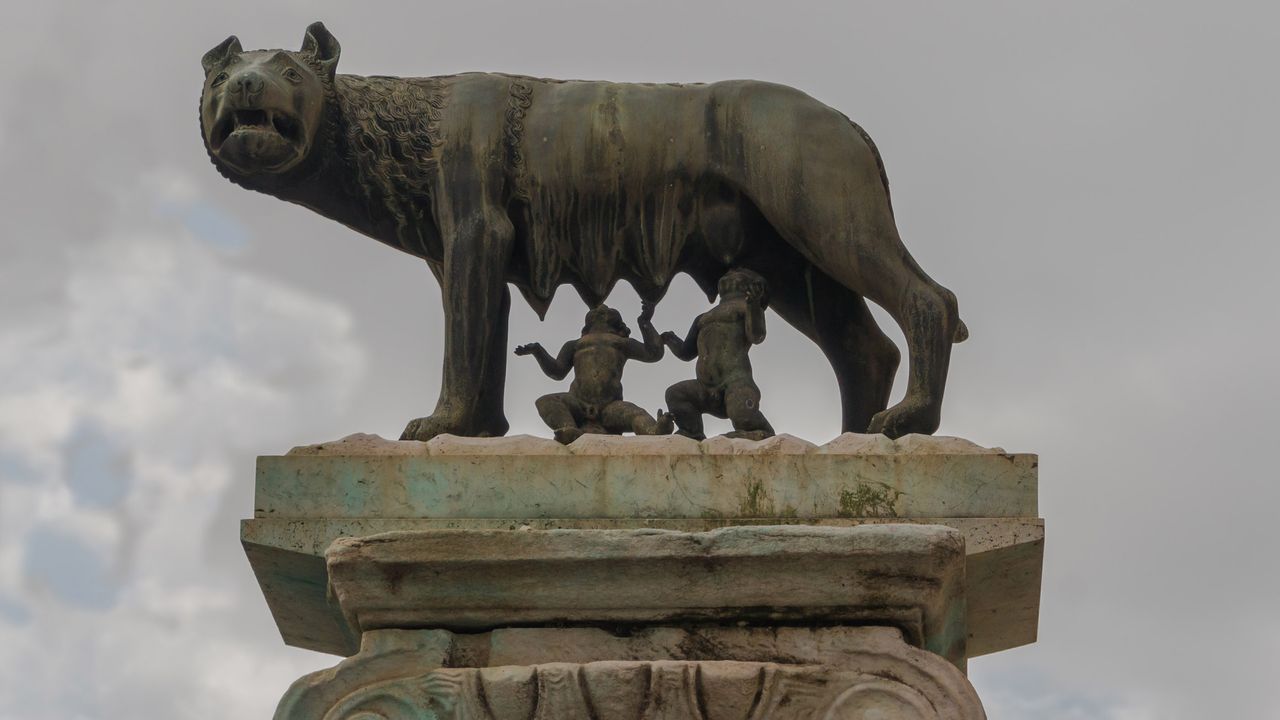 Romulus was the legendary founder and first king of Rome. The image of the infant Romulus and his twin brother Remus being suckled by a she-wolf became an emblem of the city.