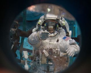 Astronauts Prepare for Mission's First Spacewalk