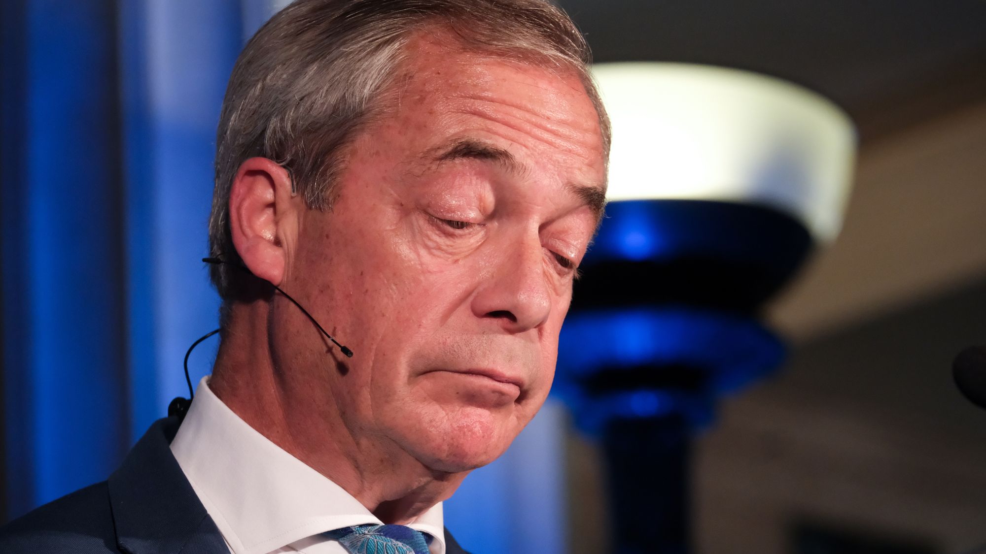 Nigel Farage looking down