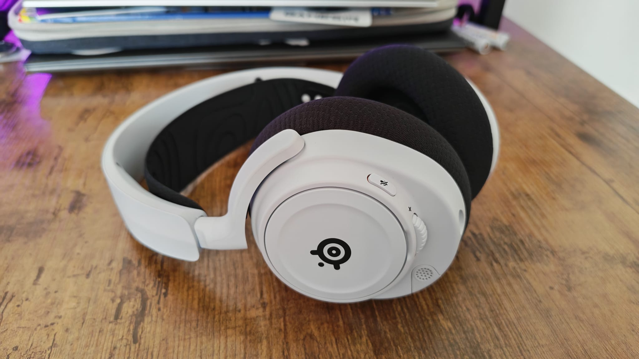 Black and white accessories on the SteelSeries Arctis Nova 7P