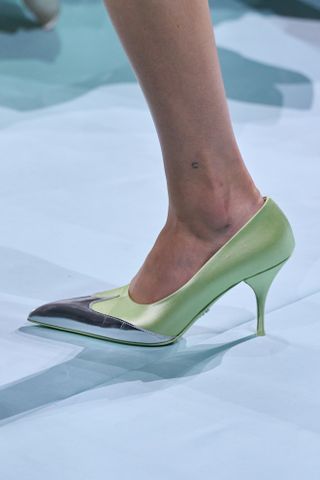 Prada spring/summer 2025 silver-toe pointed heels in green.