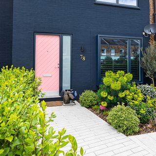 front garden with planting and pink front door