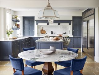 a bespoke kitchen in blue by martin moore