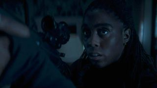 Lashana Lynch points gun in The Day of the Jackal