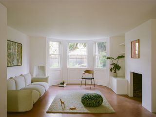 living space inside pink house, the Pigment House by unknown works