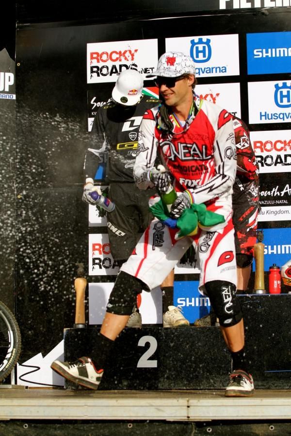 Greg Minnaar (Santa Cruz Syndicate) cracks the champagne
