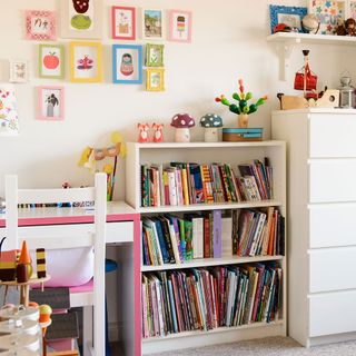 study area of the kids bed room with books shelf and study table