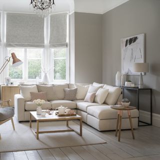 neutral living room with L-shape sofa