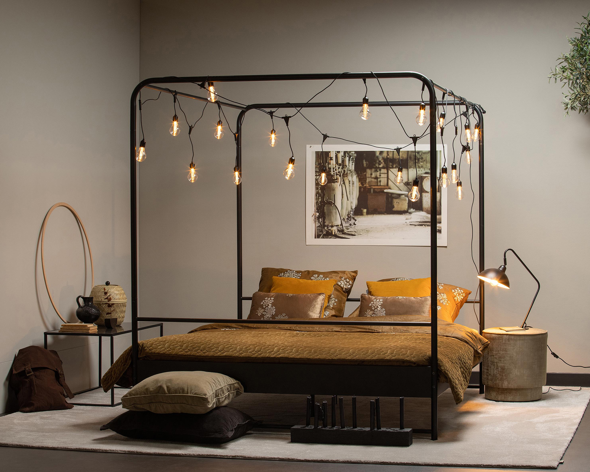 Kingsize Black Metal Four Poster Bed with Black Edison-Style Festoon String Lighting