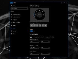 The Surface Dial settings let you configure default functions and add custom ones