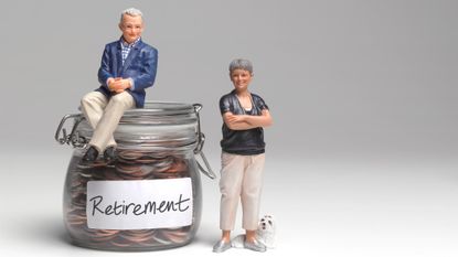 figure sitting on pension jar