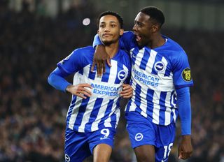 BRIGHTON, ENGLAND - DECEMBER 28: Joao Pedro of Brighton & Hove Albion celebrates after scoring their team's second goal from a penalty kick with teammate Danny Welbeck during the Premier League match between Brighton & Hove Albion and Tottenham Hotspur at American Express Community Stadium on December 28, 2023 in Brighton, England. (Photo by Bryn Lennon/Getty Images)