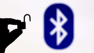 Bluetooth logo in the background with an unlocked padlock in the foreground