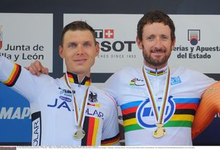 Silver medallist Tony Martin (Germany) and rainbow jersey winner Bradley Wiggins (Great Britain)