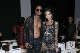 Nick Cannon and Bre Tiesi attends the Falguni Shane Peacock fashion show during New York Fashion Week