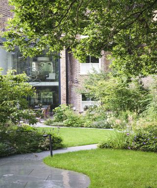 Curved pathway landscaped garden