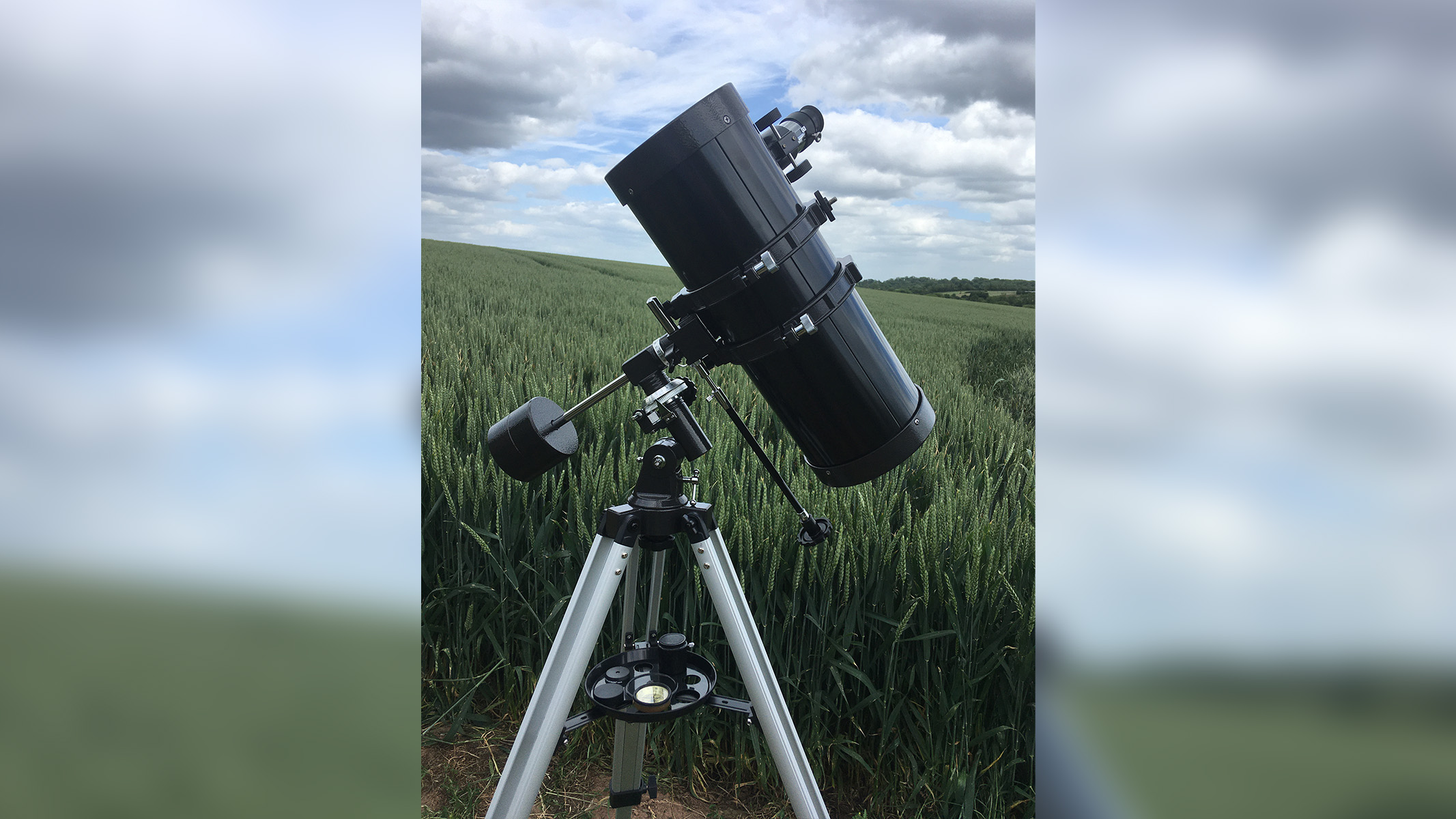 The Celestron Powerseeker 127EQ pointed at the clouds