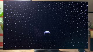 The LG G3 OLED TV with a surround sound calibration screen