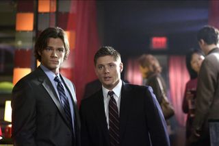 jared Padalecki and jensen ackles wear suits in a still from Supernatural