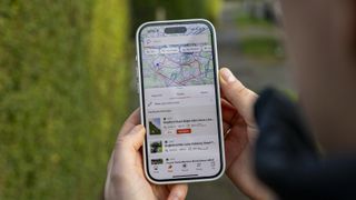 The maps feature of the Strava app open on an iPhone 15 Pro