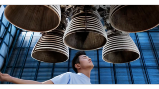 Man under bells from Baidu presentation