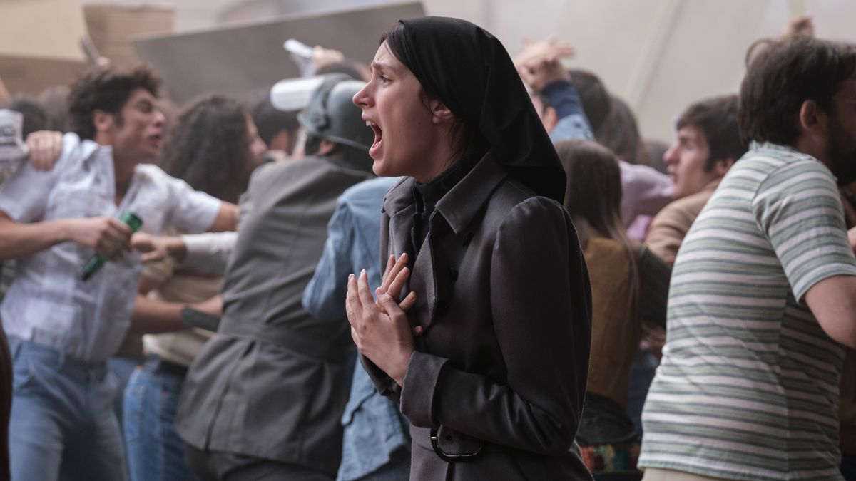 Novitiate Margaret cries out in the middle of a riot scene.