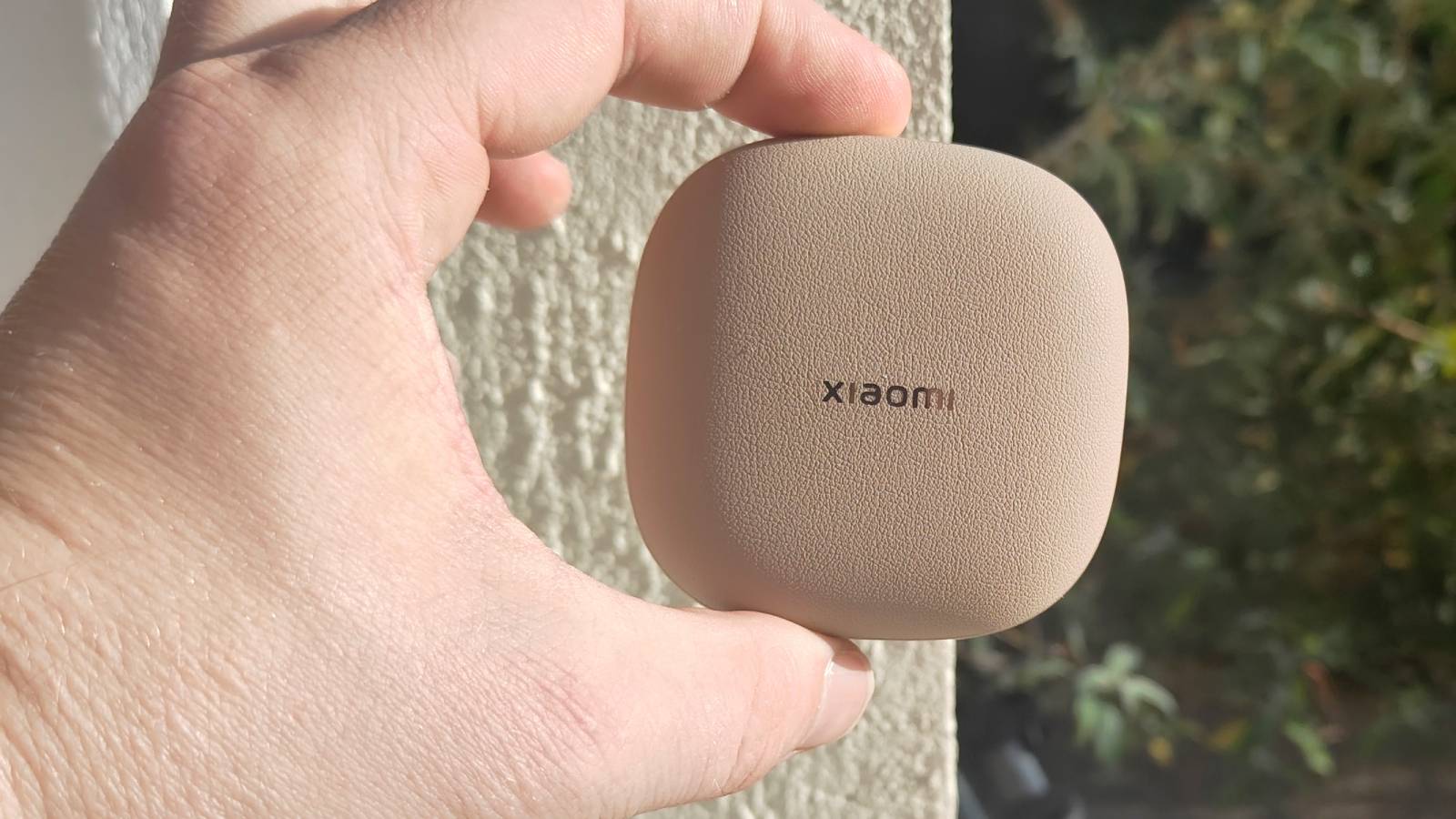 The Xiaomi OpenWear Stereo Pro in a sunny outdoor setting.