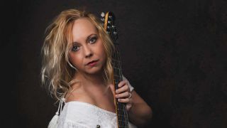 Chantal McGregor holding a guitar