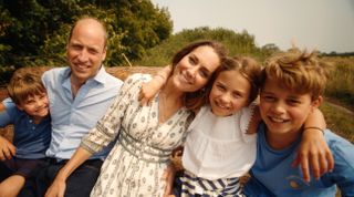 Prince Louis, Prince William, Kate Middleton, Princess charlotte and Prince George hugging outside