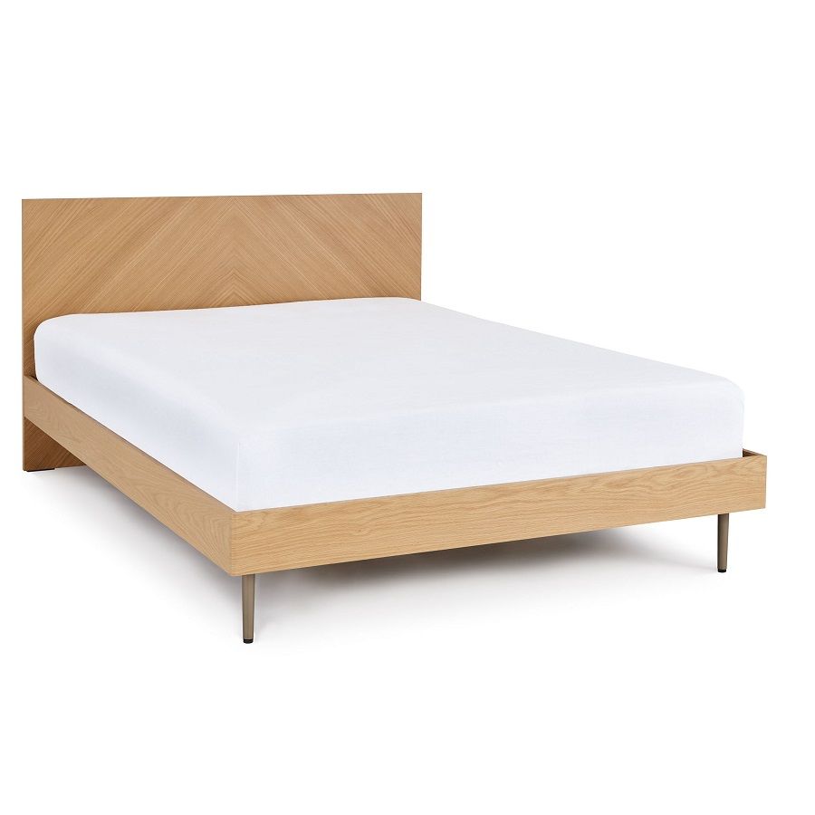 An oak bed with a headboard