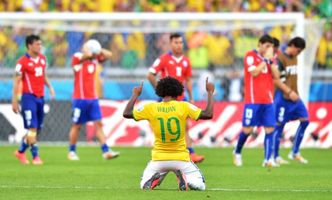 Brazil&amp;#039;s Willian Borges da Silva celebrates after the host team knocked off Chile