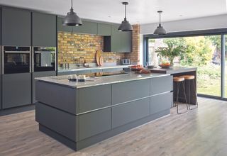 open plan kitchen with large island and sliding doors