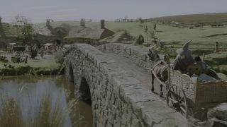 A scene of a bridge in the Lord of the Rings