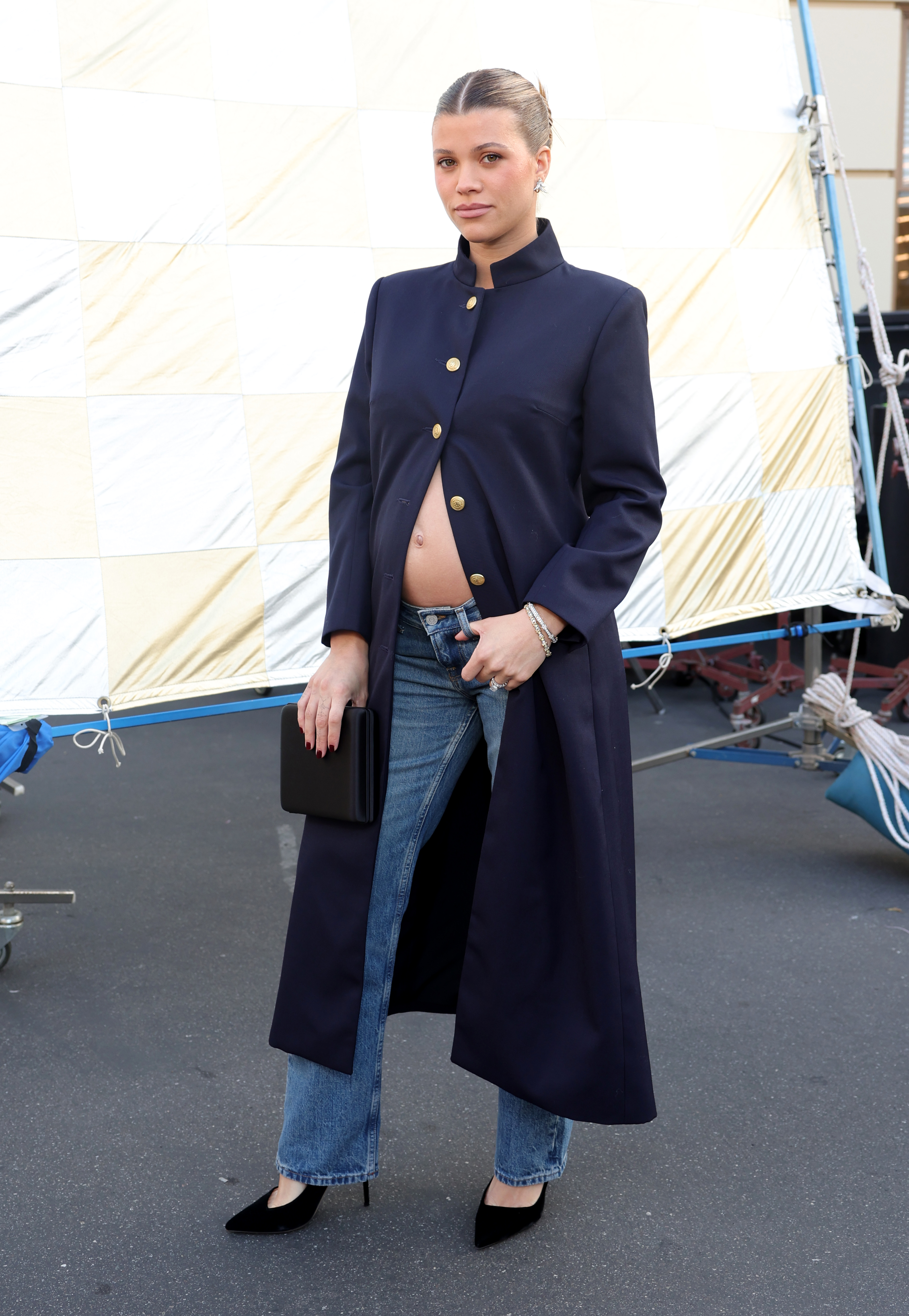 Sofia Richie Grainge debuted her growing baby bump under the military jacket trend