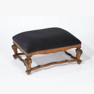 black upholstered ottoman from wayfair